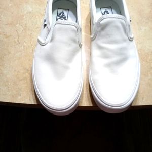 Women's Van's white slip ons, only tried on in house.
